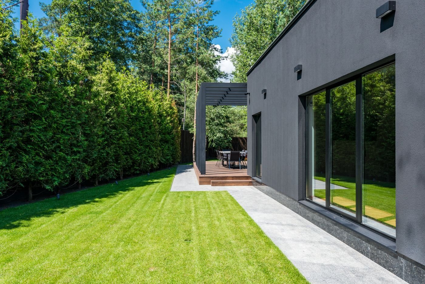 Fresh, polished home exterior with a green lawn